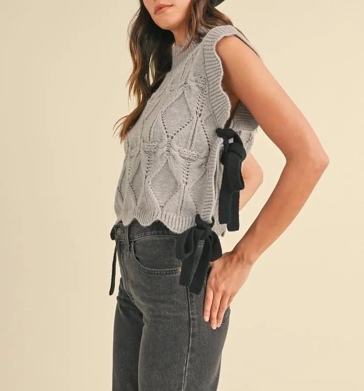 NUFIWI Womens Y2K Ribbon Bow Sweater Vest Chunky Cap Sleeve Knit Vest with Bows Casual Lace Up Bandage Crochet Knit Tank